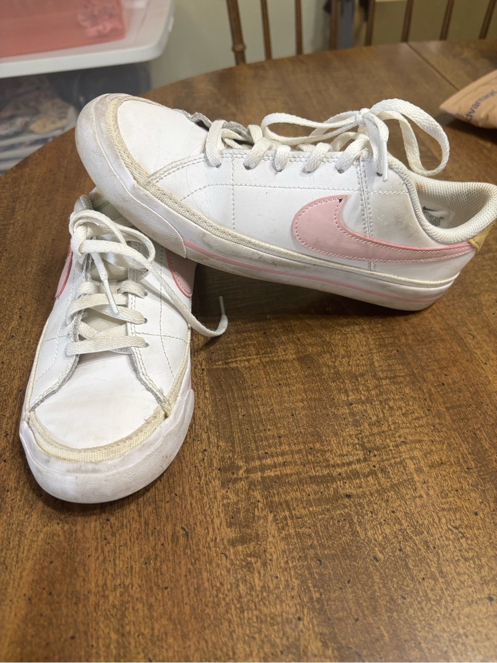 Nike White Low-Top Sneakers with Pink Swoosh